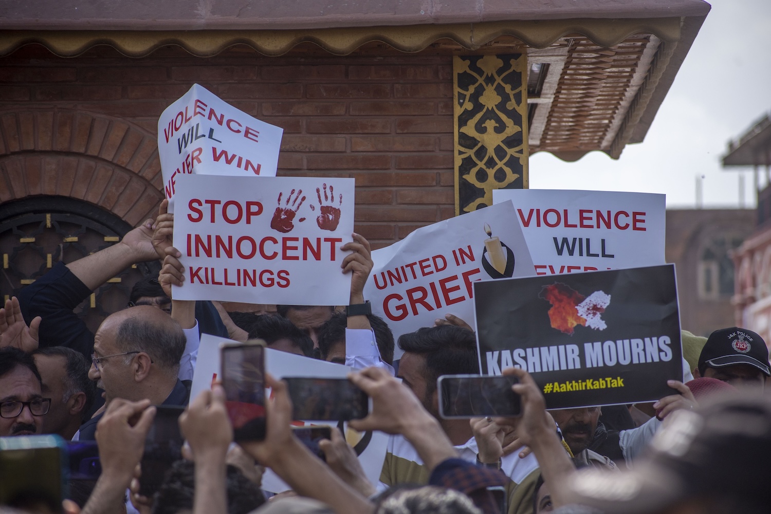 Activists and supporters of the National Conference (NC) Kashmirs ruling party hold placards as they shout anti-Pakistan and anti-militant slogans during a protest against the killing of tourists, on April 23, 2025 in Srinagar, India.